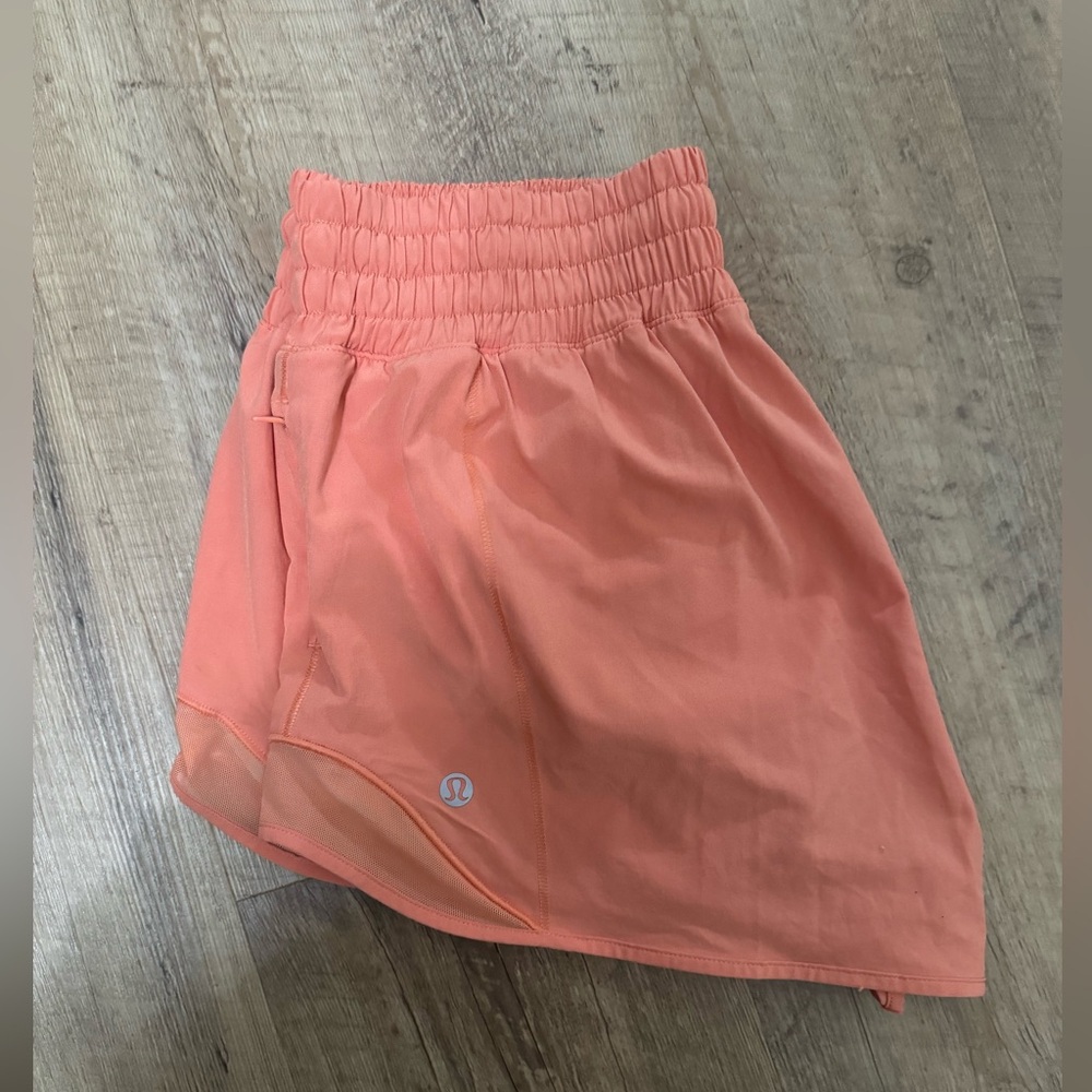 Lululemon size 6 high rise hotty hot shorts in color Highlighter Orange